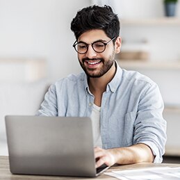 typing on laptop