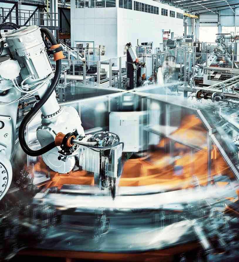 A picture containing an indoor industrial factory machine